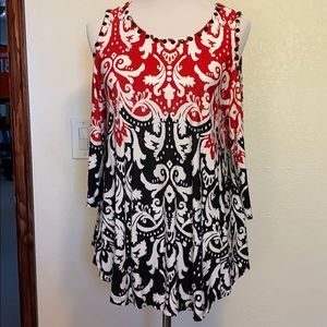Red and black cold shoulder tunic.